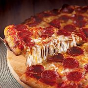 Pizza Pizza: Get Four Small One-Topping Pizzas for $20.00 on April 20